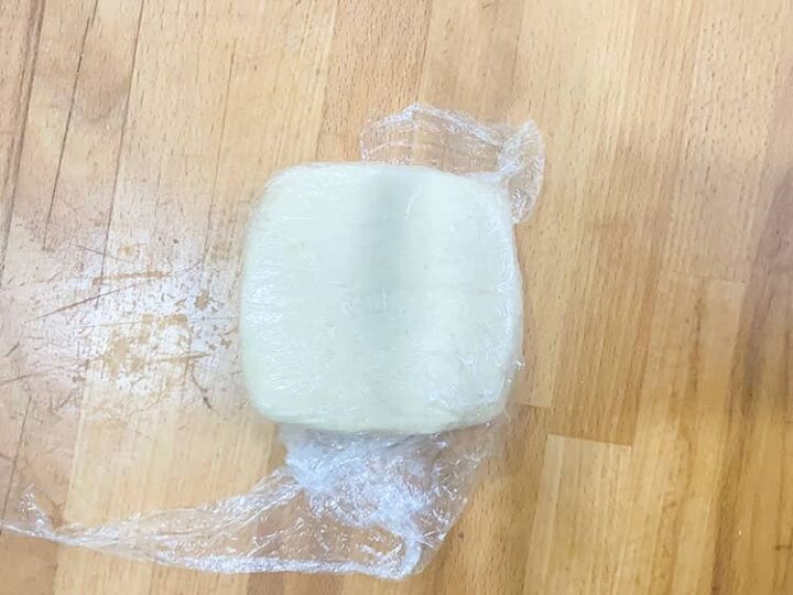 dough wrapped in cling film.
