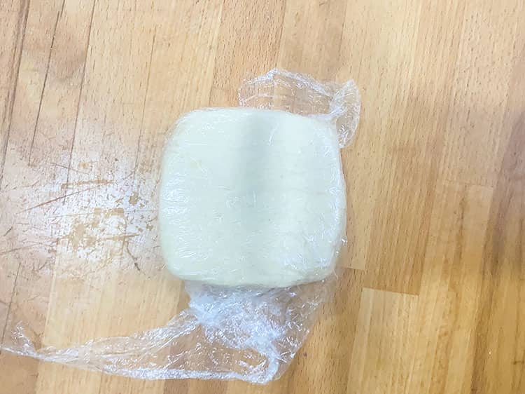dough wrapped in cling film.