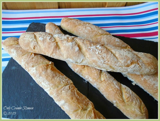 4 baguettes on a board