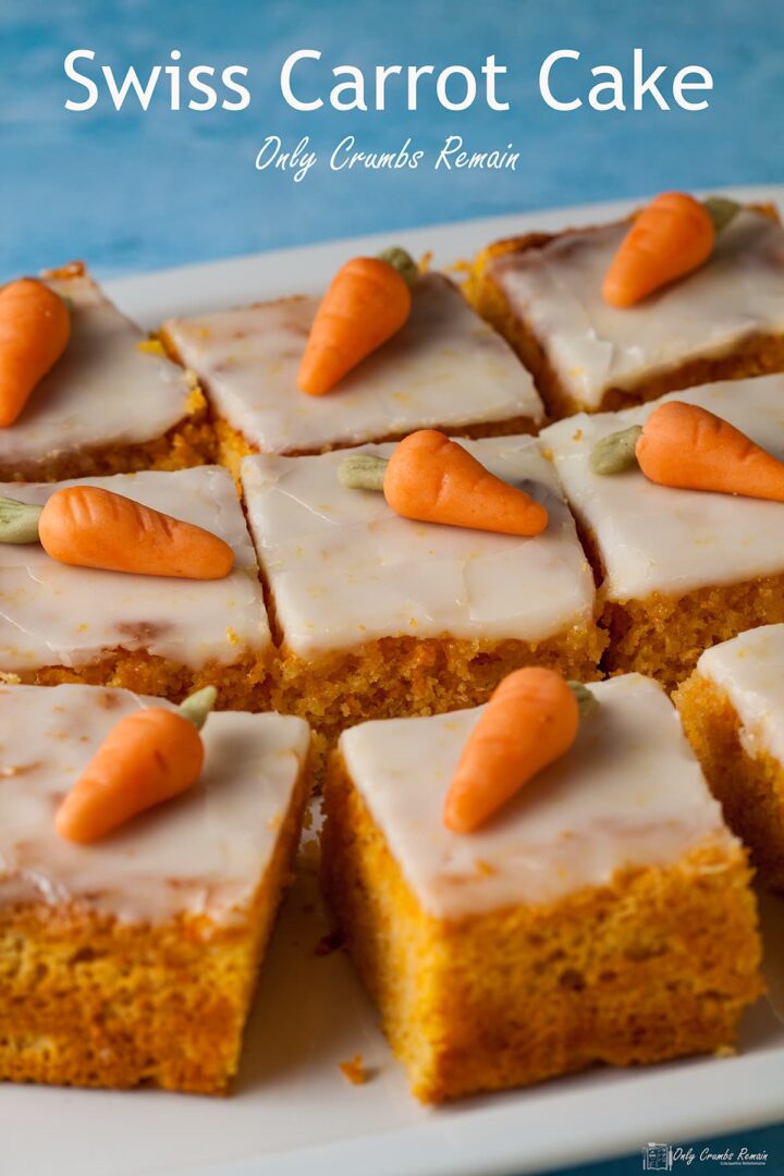 Swiss carrot cake baked in square tin cut into squares.