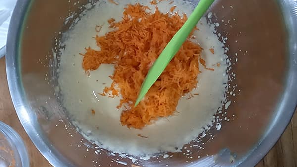 carrots edded to whisked egg yolks and sugar mixture.