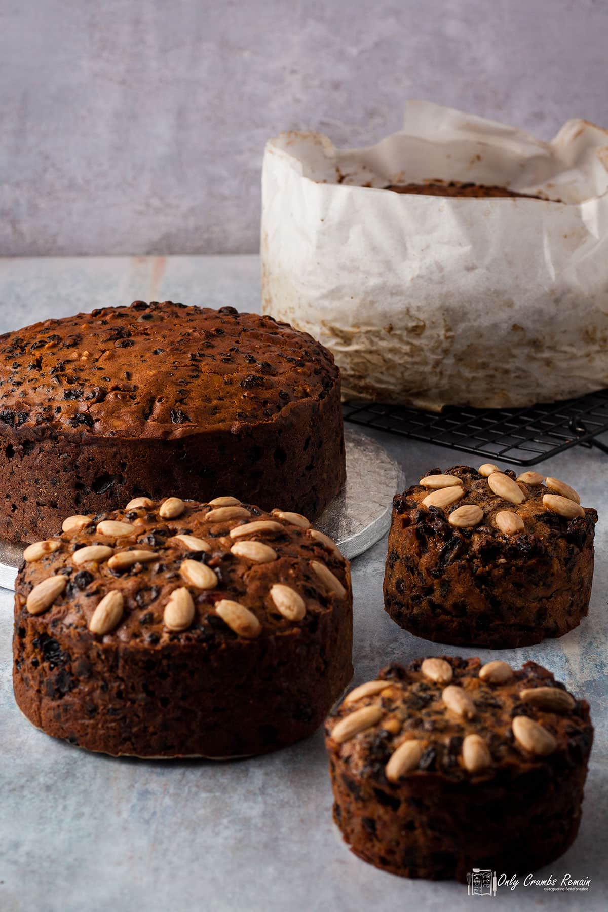 selection of different sized rich fruit cake.