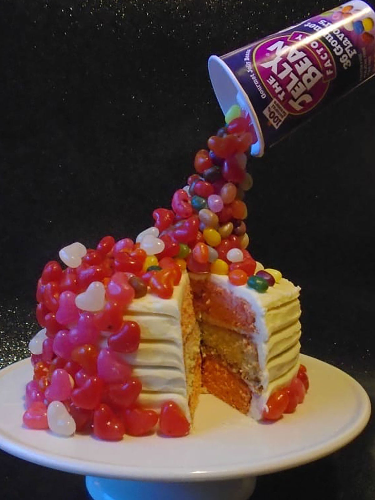 jelly bean illusion cake with sliced removed.