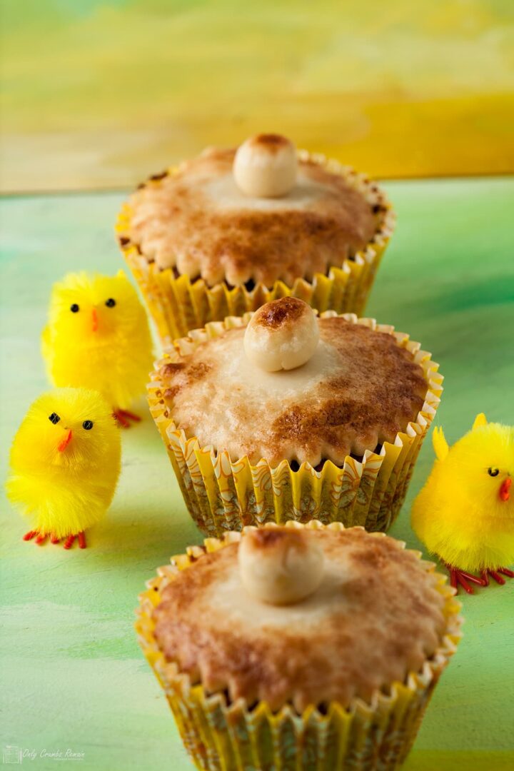 3 toasted simnel cupcakes with Easter chick decorations