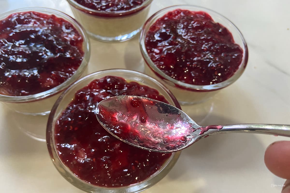 spreading puddings with jam.
