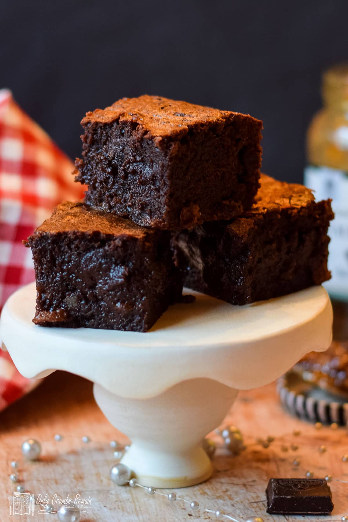 3 pieces mincemeat brownies on a stand.