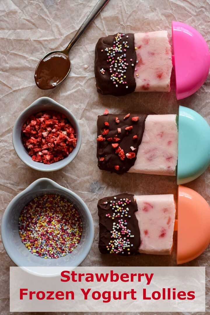 strawberry yogurt lollies coated in chocolate with various sprinkles