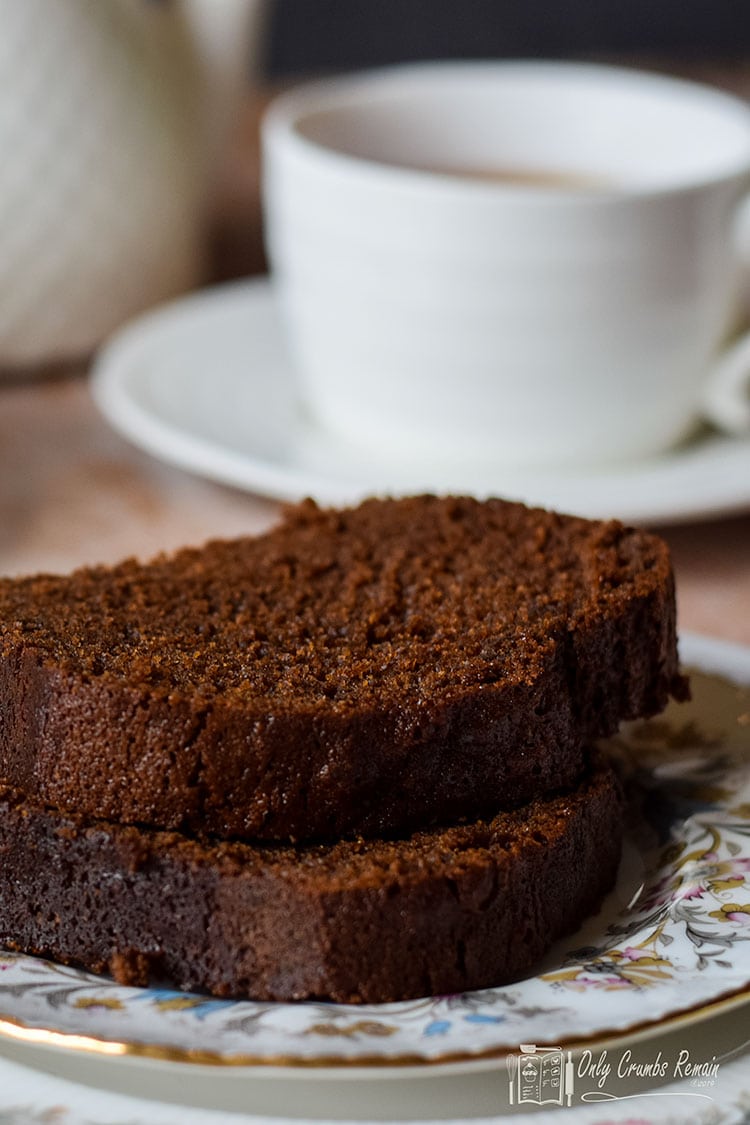 two slices of homemade gingerbread cake on a plate.