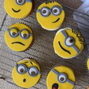 minion cupcakes on a cooling rack.