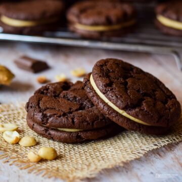 two chocolate and peanut butter sandwich cookies.