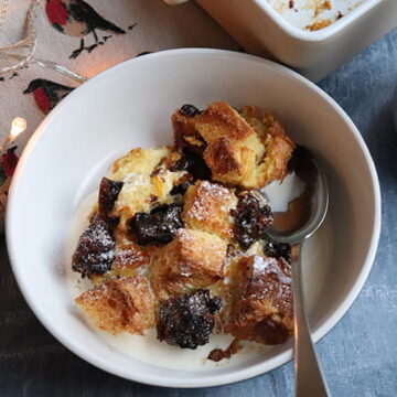 Christmas pudding bread and butter pudding in a bowl.