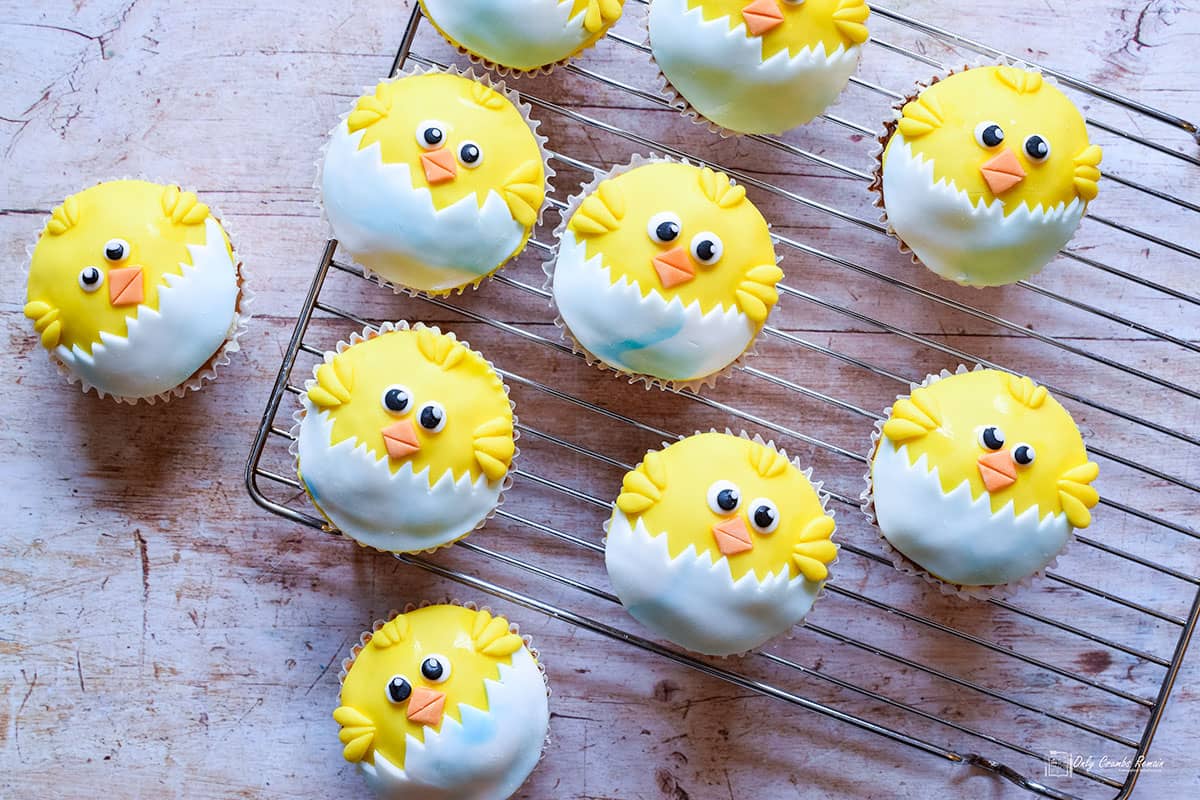 easter chick cupcakes on wire rack.