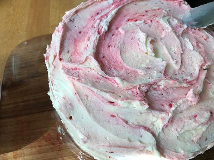 cake roughly covered with butter cream