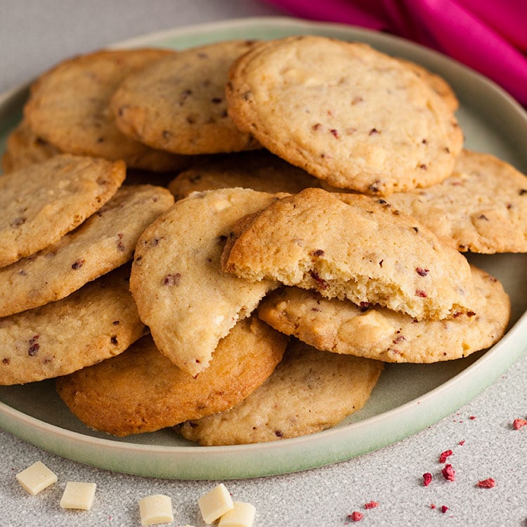 raspberry and white chocolate chip cookies on a plate