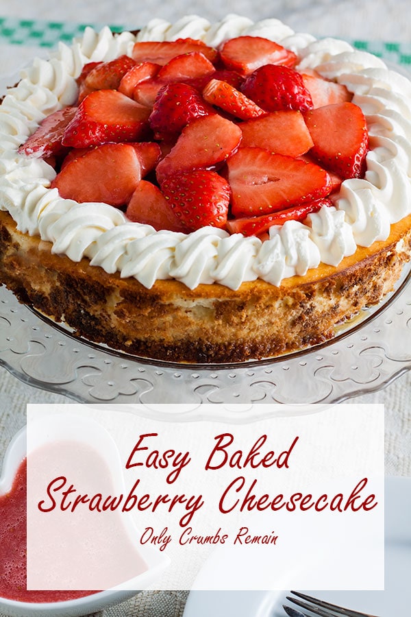 easy baked strawberry cheese cake on a glass stand.