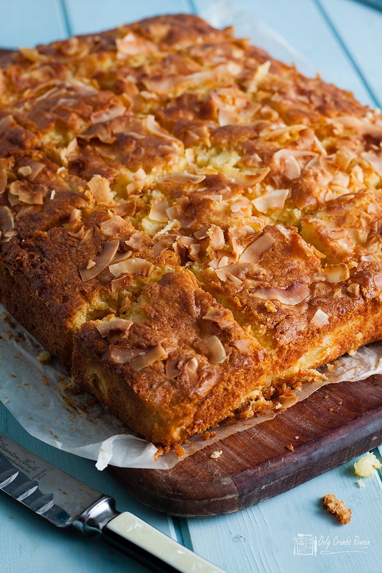 pineapple and coconut traybake cut into squares