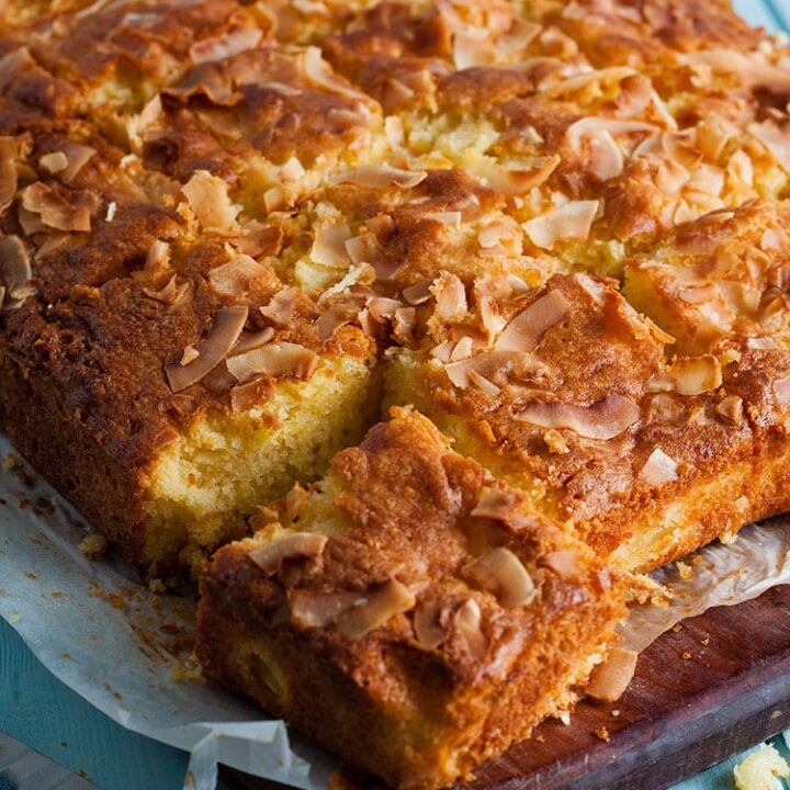 pineapple and coconut traybake cut into squares