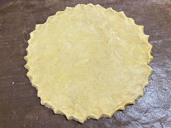 circle of pastry with crimped edges.