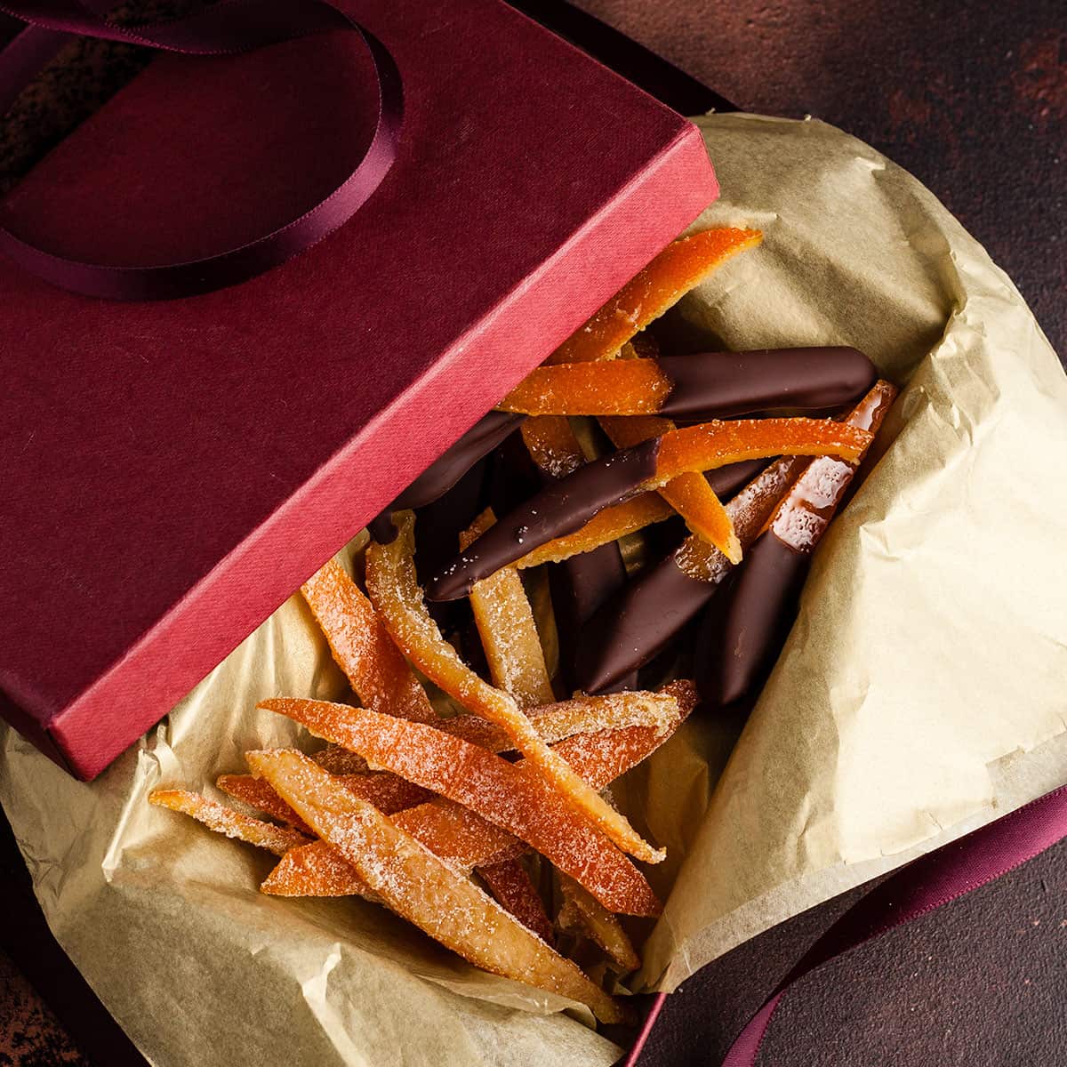 chocolate dipped and plain candied orange peel in a gift box.