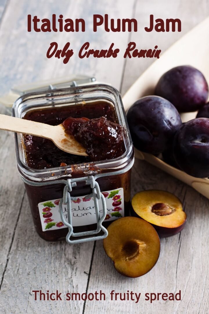 spoonful of Italian Plum jam being lifted from jar.