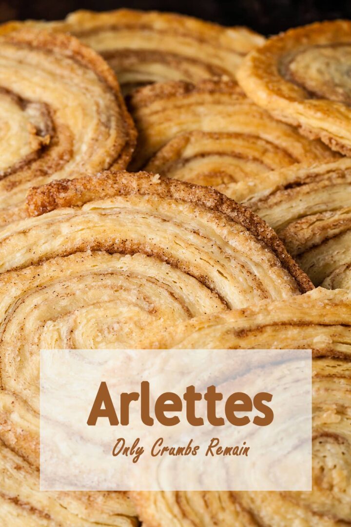 Arlettes spread out on background showing swirl of cinnamon.