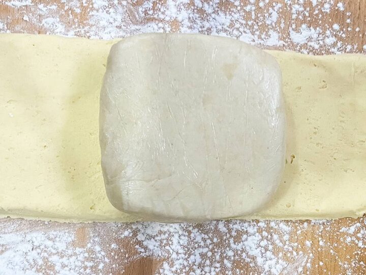 Dough in centre of butter layer.
