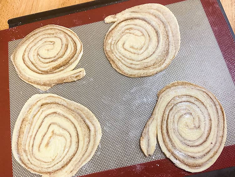 uncooked arlettes on baking tray.