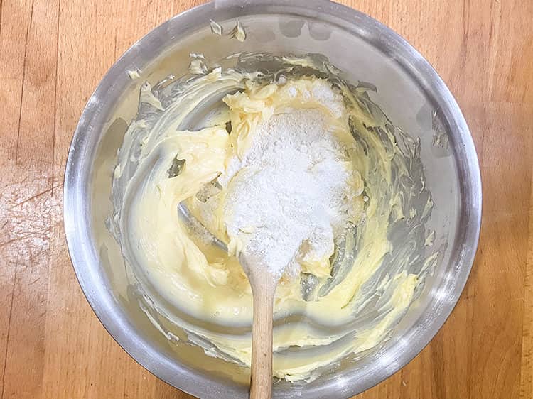 softened butter in a bowl with flour.
