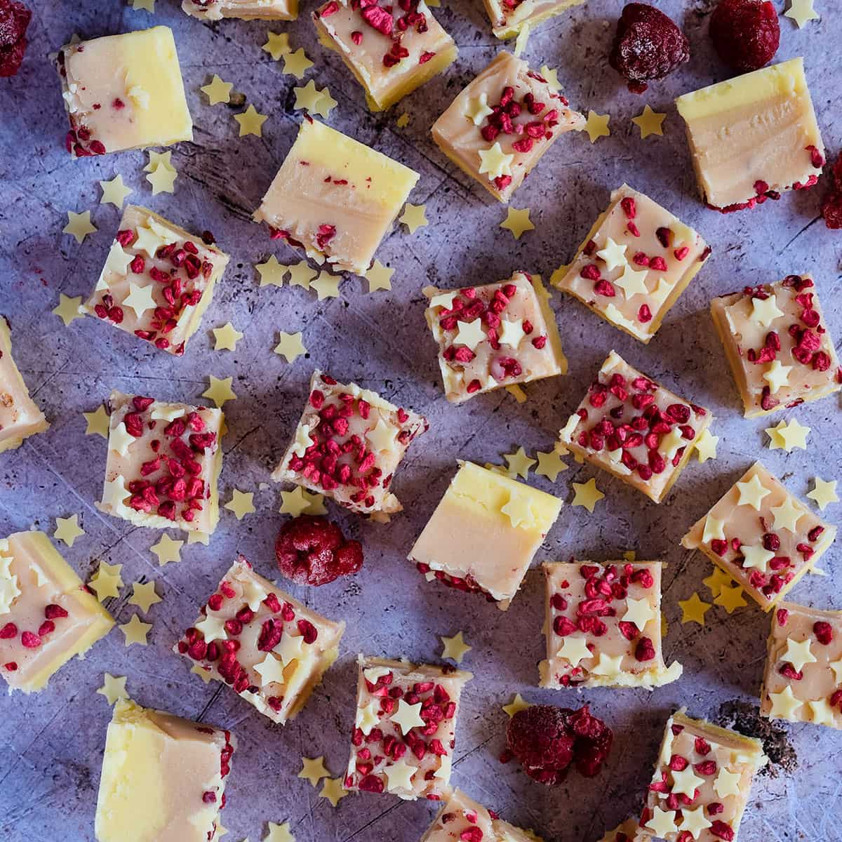 raspberry and white chocolate fudge cut into squares.