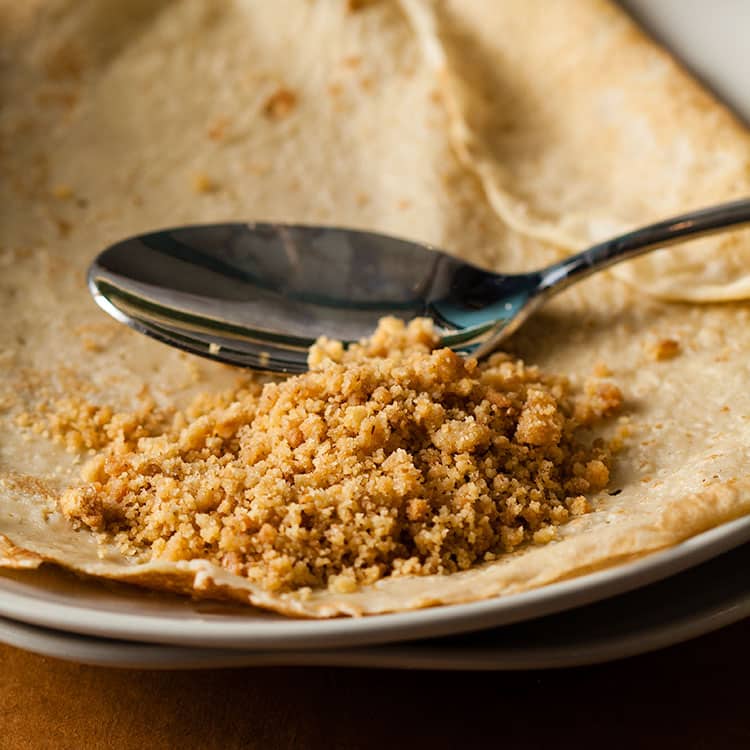 pile of crumbs on a pancake.