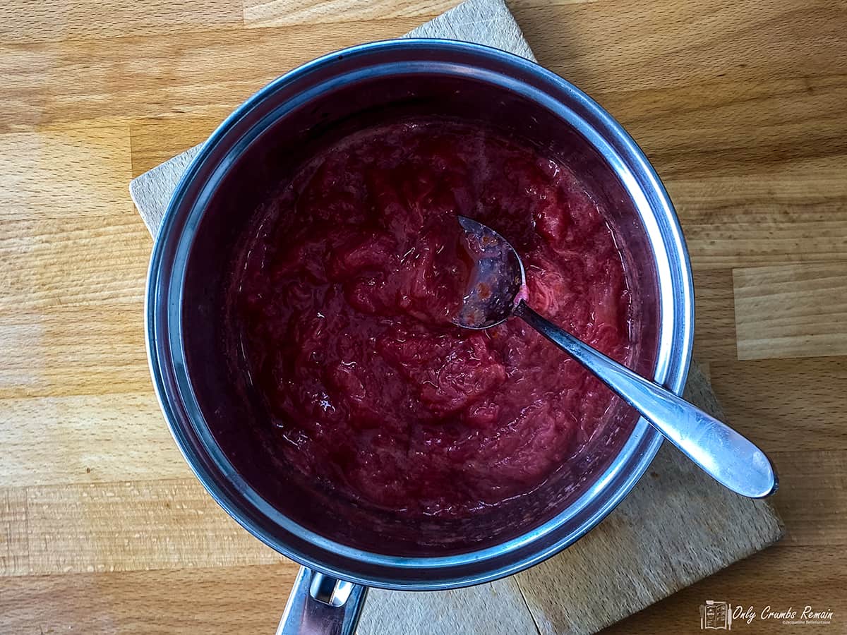 cooked rhubarb compote in pan.