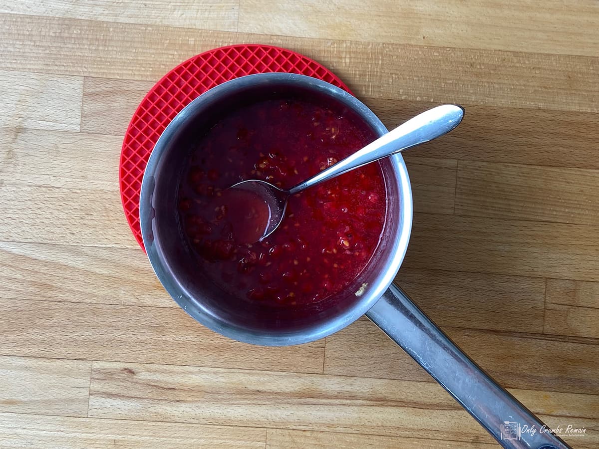 redcurrant compote in saucepan.