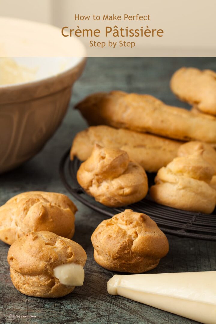 Crème Pâtissière in a piping bag with some piped imto choux pastry buns.